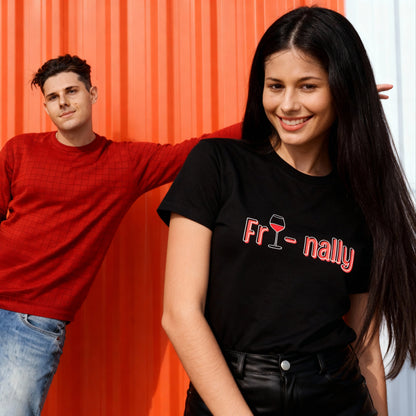 Two people standing against an orange wall, one wearing a red shirt and jeans, the other wearing a black t-shirt with 'Fri-nally' text.
