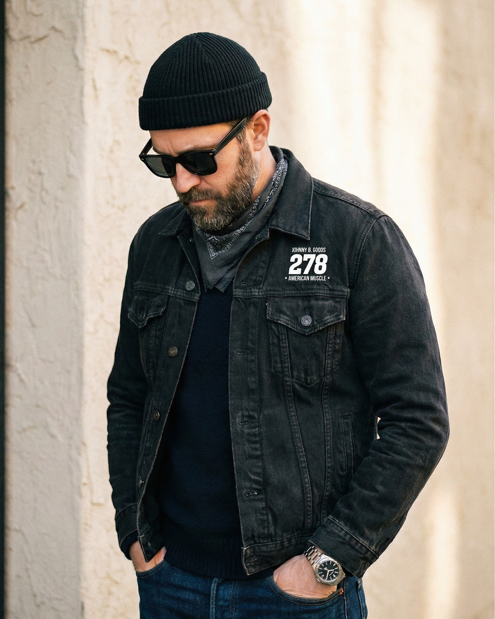 rugged man wearing a jbg black denim motor jacket