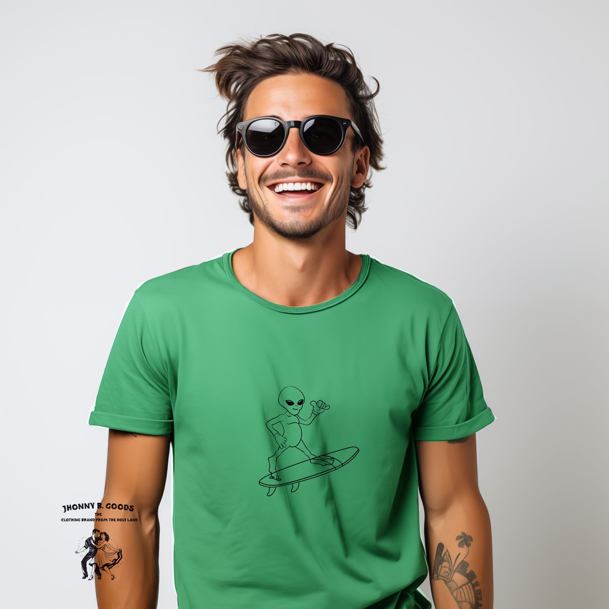 picture of man wearing green alien surf tee