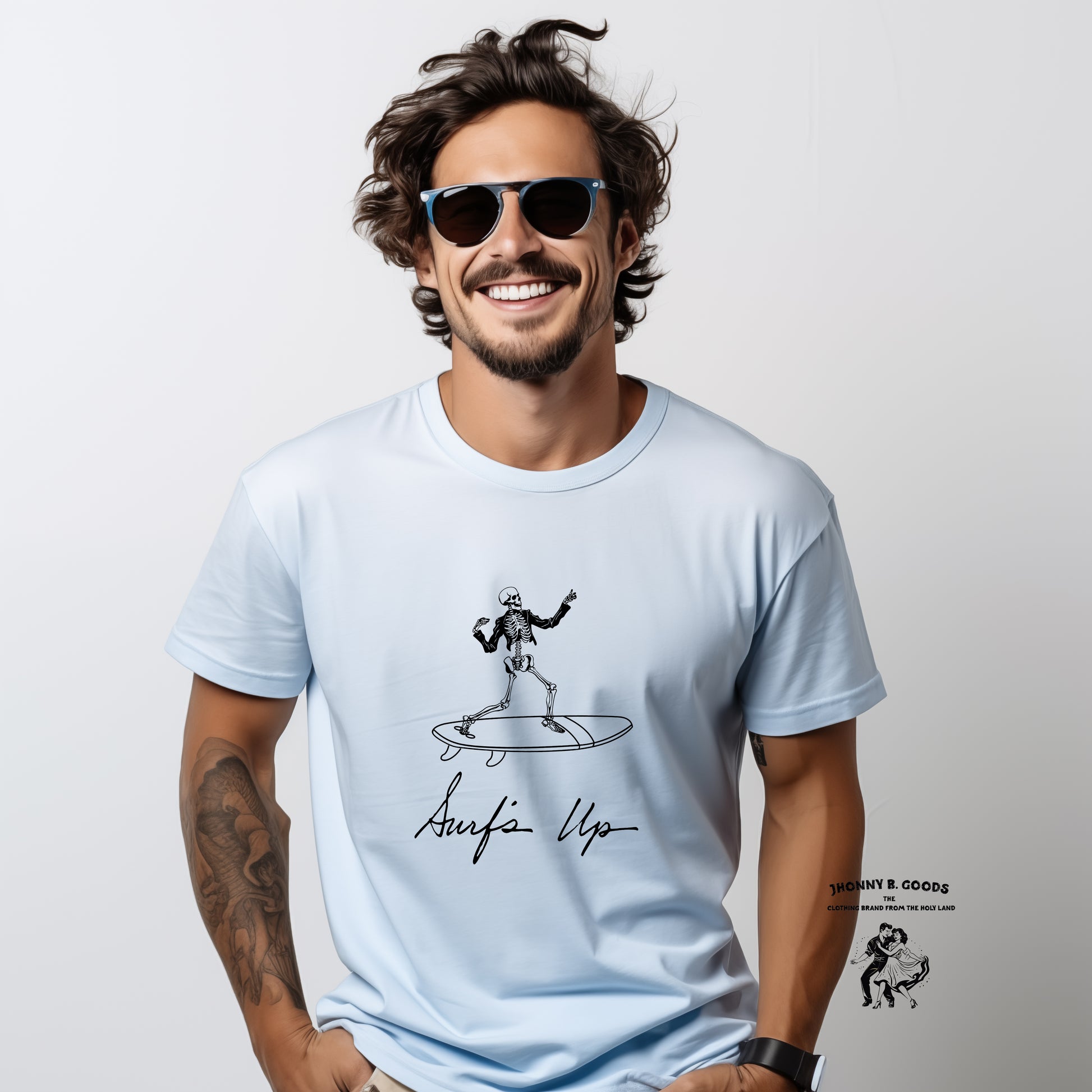 picture of man wearing light blue surf tee